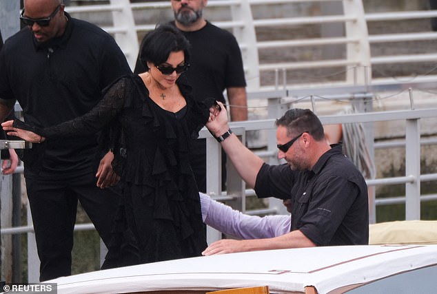 Kris received a helping hand as she made her way onto the river taxi