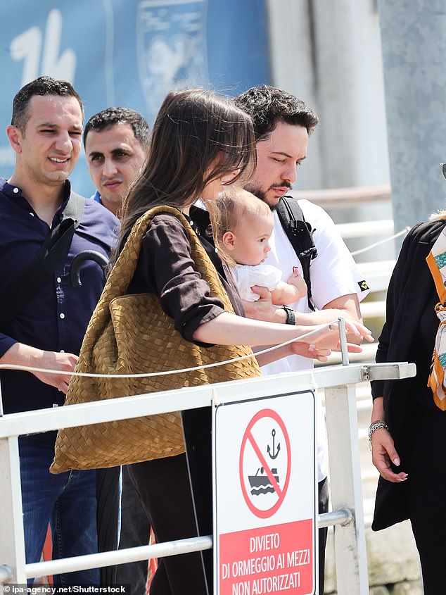 Princess Rajwa Al Hussein with her daughter Iman Bint Hussein And her husband Prince Hussein Bin Abdullah