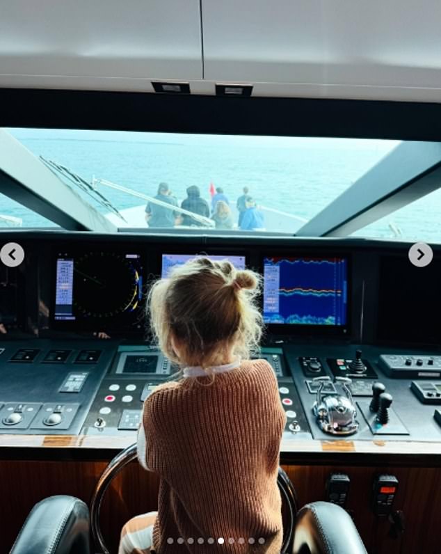 Katy also included a rare shot of her daughter Daisy Dove sitting in the captain's chair of a boat