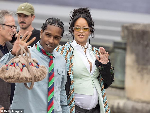 The Umbrella hitmaker certainly drew attention from the crowd as she walked in on the arm of her love, who opted for a pale blue skirt with a striped tie worn over the collar