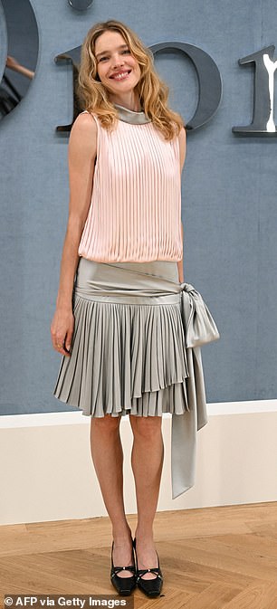 Russian model Natalia Vodianova opted for a pink and grey pleated look