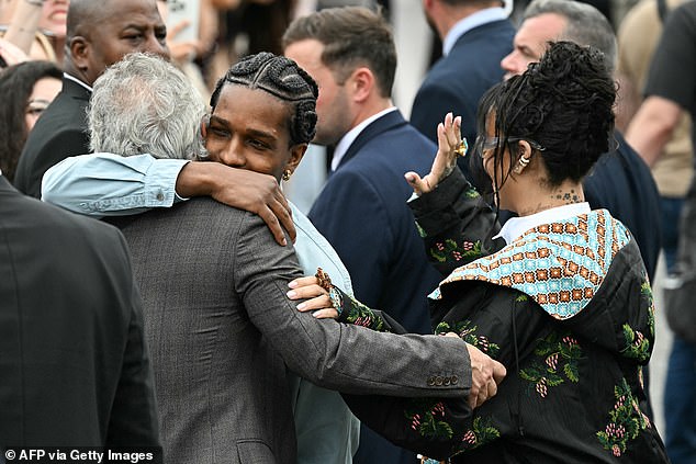The rapper was seen greeting a fellow attendee at the show