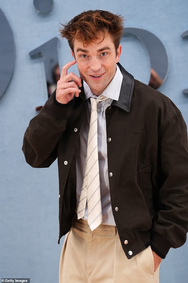 He was all smiles at the photocall