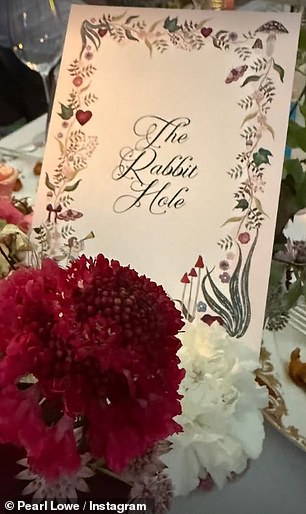 She also gave a glimpse at the floral-themed table name signs and dusky pink ribbon place names