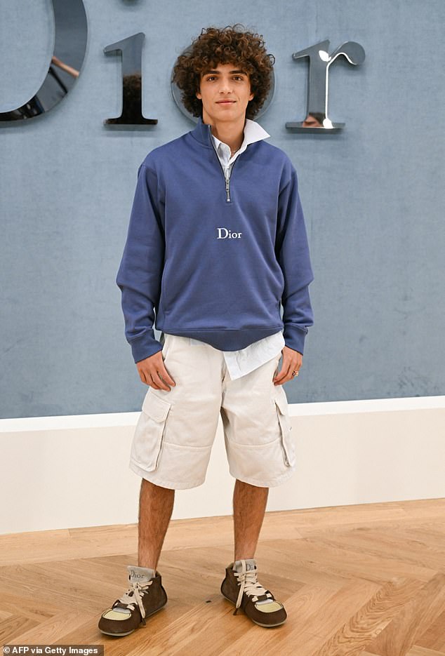 The dashing 16-year-old, whose dad won an Oscar for Dallas Buyers Club , looked completely at ease in front of the flashbulbs as he modeled a luxe light blue Dior pullover paired with crisp white cargo shorts