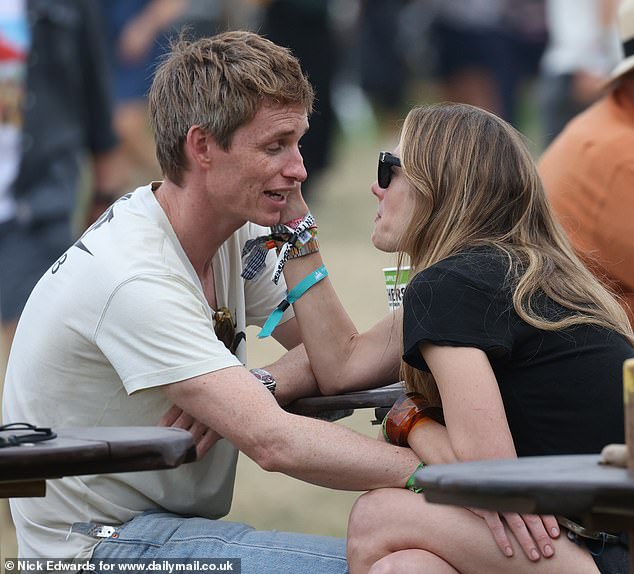 The couple, who have been married for 11 years, could barely keep their hands off of one another as they attended the festival while their two children were nowhere to be seen
