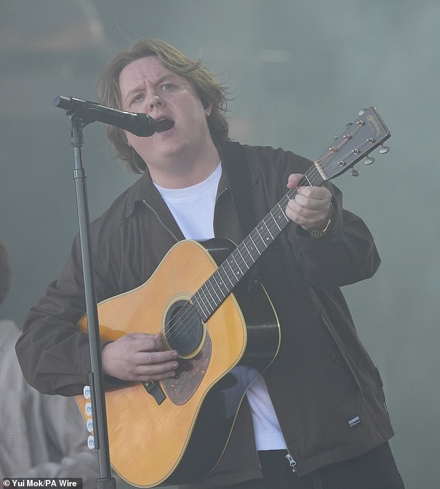 The Scottish singer was greeted with cheers from the huge Worthy Farm crowd, two years after his battle with Tourettes left him unable to finish his perfomance at the festival