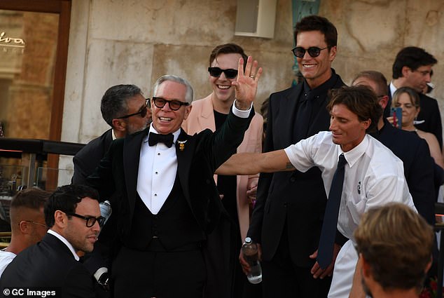 After Hilfiger was steady on his feet again, Brady appeared to make a joke and, while smiling, said to the fashion designer: 'Are you drunk?' Hilfiger seemingly cracked a joke back before Brady allegedly added: 'Can you just get on?'