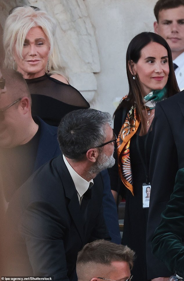 The Australian producer, 69, who recently finalised her divorce from ex-husband Hugh Jackman, was spotted leaving her hotel with other A-list guests