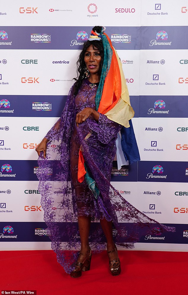 She completed the bizarre outfit with a colourful headscarf