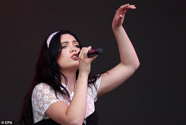 She cut a stylish figure in a white lace ensemble, which she styled with a hairband to complete her look
