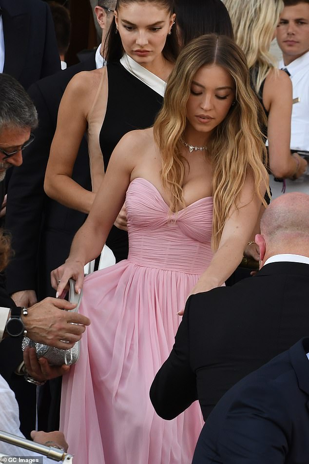The actress and legendary quarterback were both guests at the Bezos-Sanchez wedding
