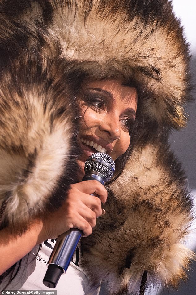 She completed her onstage ensemble with a huge furry hat