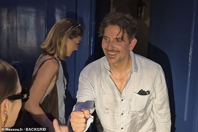 The Hangover star Bradley, 50, was also dressed for the summer and wore a pair of grey loose-fitting trousers