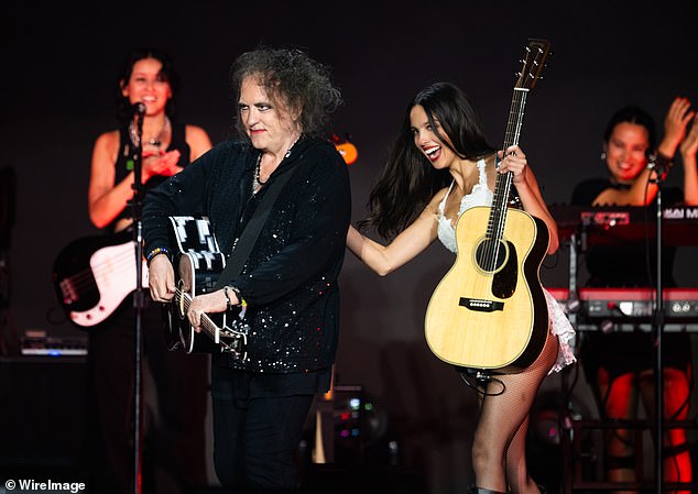 The singer was later joined on stage by Robert Smith from the Cure as the duo performed a rendition of Friday I'm in Love, which appeared on The Cure's 1992 album Wish