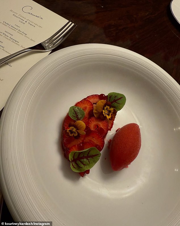 Alongside a shot of a strawberry sorbet dessert, a part of the multi-course menu card was peeking out of the corner and wished the happy couple a happy third anniversary.