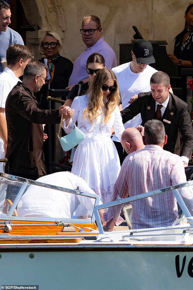 After a weekend full of festivities celebrating the nuptials of Jeff Bezos and Lauren Sanchez, the 27-year-old actress looked weary as her team helped her get into a water taxi to leave her hotel