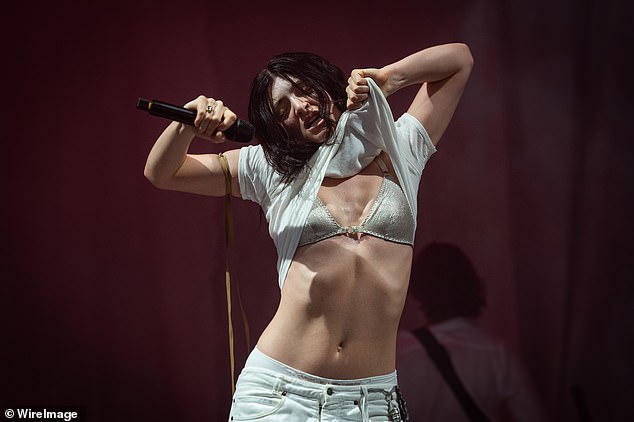 Lorde sent fans into a frenzy with a surprise performance at Glastonbury on Friday morning, which saw her whip her top off in the sweltering heat