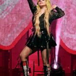 Avril Lavigne reunited with her ex-husband Deryck Whibley as the pair played a set together during Vans Warped Tour rock festival (Seen last month)