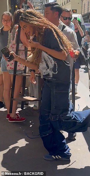 Arriving in Paris on Wednesday, Blue looked a mirror image of Bey as she stepped out of a chauffered car