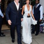 Brad Pitt's age-gap girlfriend Ines de Ramon donned an extremely risque bridal-inspired look as she supported the star at the NYC premiere of his film F1 on Monday