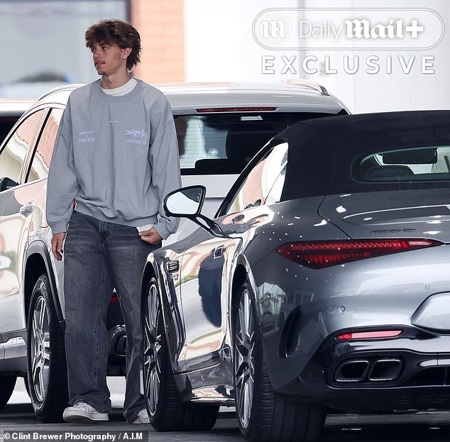 Jayden, 18, arrived in his brand new car, while Spears followed behind in her black Mercedes G-Wagon