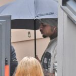 Chris Brown, 36, hid his face as he returned to perform in Manchester on Sunday, a month after being arrested in the city over an alleged nightclub bottle attack