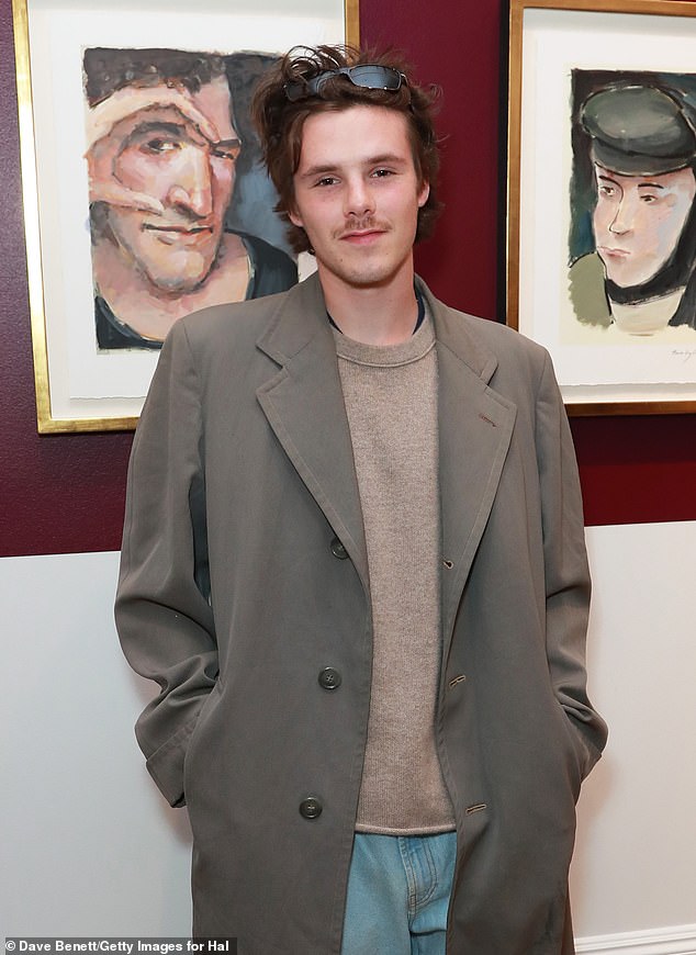Cruz Beckham, 21,  (pictured) appeared to take yet another swipe at elder brother Brooklyn and declared the 'truth would unfold' as the family's bitter feud continues to rumble on