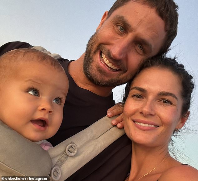 Aussie DJ Fisher - real name Paul Fisher - and wife Chloe Chapman have given their one-year-old daughter Bobbi a designer bag for her birthday. All pictured