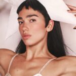 Dua Lipa FINALLY confirms engagement to Callum Turner as she reveals romantic way they met - and how he picked the ring