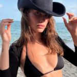 Hailey Bieber gave fans a jolt on Sunday by posting a series of sizzling bikini snaps—possibly a move to shift attention from the growing concern surrounding her husband Justin Bieber