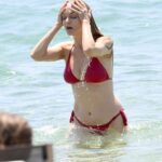 Heather Graham sent temperatures soaring during a sizzling beach outing in Sardinia on Friday