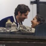 Sarah Roberts packed on the PDA with her new beau Jake Iesu on Friday as the happy couple attended an art show in Sydney