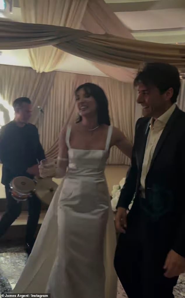 Dressed in a smart black suit and white shirt, James appeared to be having a great time as he twirled bride Megan around on the dancefloor