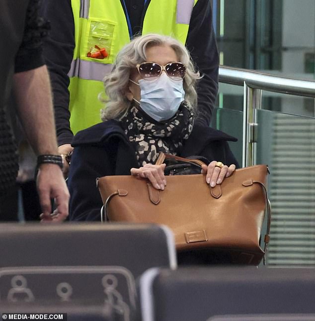 The Grace and Frankie star kept her look polished and understated, accessorising with a patterned scarf