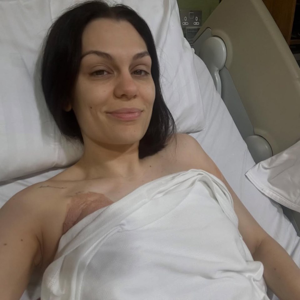 Jessie J in a hospital bed after breast cancer surgery.
