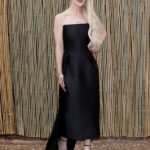 Kelly Osbourne showcased her slender frame in a chic black dress as she attended the glitzy Serpentine Gallery Summer Party in London on Tuesday