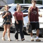 Playboy vet Kendra Wilkinson made an Erewhon run with her two kids, Hank IV and Alijah, on Tuesday. Her 15-year-old son towered over her 5'4