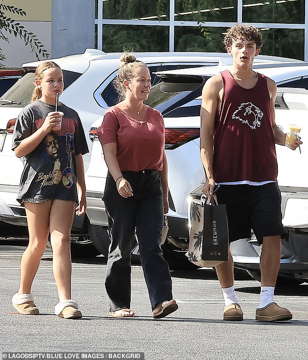 Playboy vet Kendra Wilkinson made an Erewhon run with her two kids, Hank IV and Alijah, on Tuesday. Her 15-year-old son towered over her 5'4