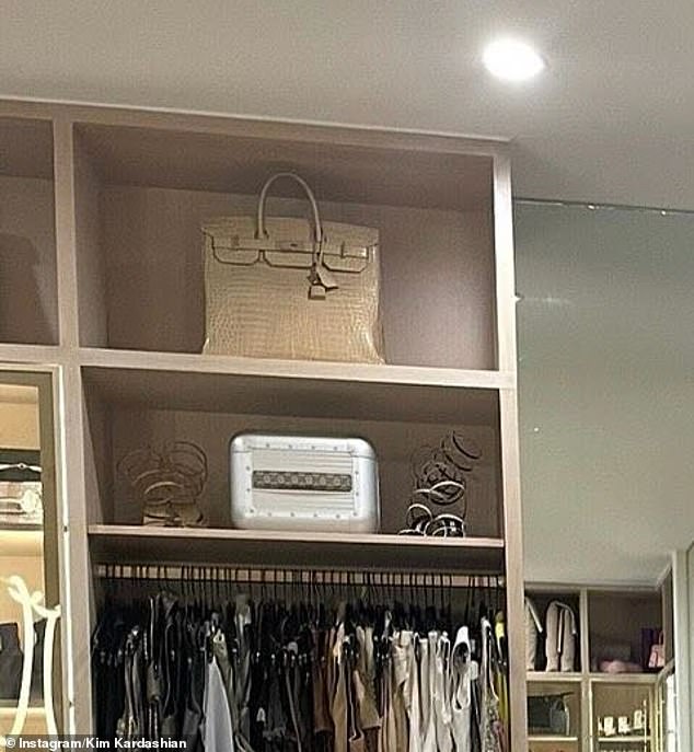 It is also hard to tell what this silver box is between two pairs of gladiator heels