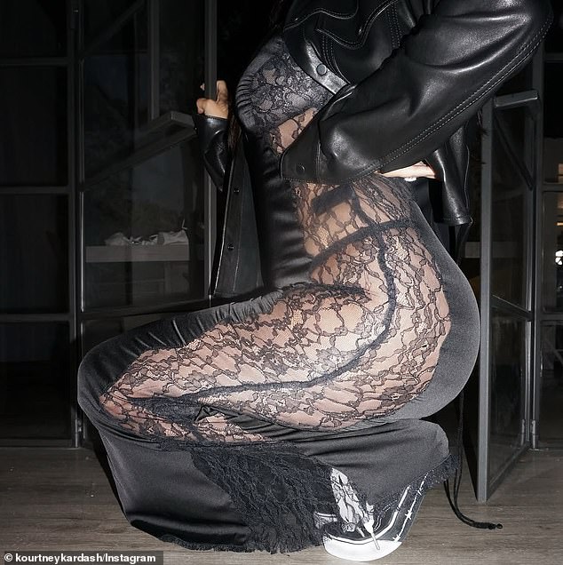 Kardashian also shared sultry snapshots of her sultry, all-black outfit she appeared to have worn for a date night with her husband. She wore a black satin slip, which had sheer, lace details along the side to show off her sexy silhouette and her toned legs