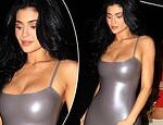 Kylie Jenner squeezes her surgically-enhanced cleavage into silver dress after shock boob job admission
