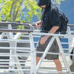 Leonardo DiCaprio continued his attempts to pass unrecognised as he departed Venice on Sunday morning, following Saturday night's final party of Jeff Bezos and Lauren Sanchez 's wedding extravaganza