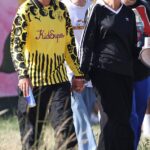 Louis Tomlinson, 33, and Zara McDermott, 28, put on a loved up display as they strolled hand-in-hand through Worthy Farm as Glastonbury Festival kicked off on Thursday