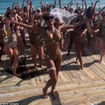 Mel B, 50, flaunted her incredible figure as she and 35 pals slipped into Scary Spice's leopard print bikinis amid her sun-soaked hen party on Saturday