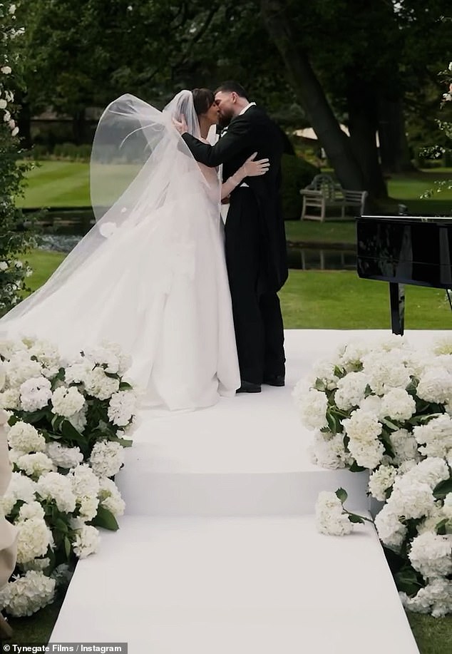 Newlyweds Megan McKenna and Oliver Burke looked smitten in their romantic wedding video shared to Instagram on Tuesday as they celebrated with their family and friends