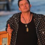Orlando Bloom embraced his new single status by sporting pajamas during Jeff Bezos and Lauren Sanchez's wedding weekend in Venice