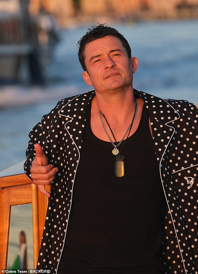 Orlando Bloom embraced his new single status by sporting pajamas during Jeff Bezos and Lauren Sanchez's wedding weekend in Venice