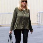 A former Playboy magazine star stepped out for a rare outing in Los Angeles over the past weekend - can you guess who it is?