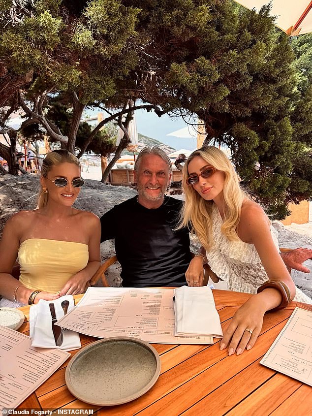 The former reality star, 30, is away with her partner and family, including her famous dad Carl and sister Danielle as the group after announcing her pregnancy (pictured)